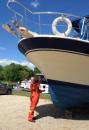 Wax on - Wax off. : Polishing hull and painting bottom before launch day.